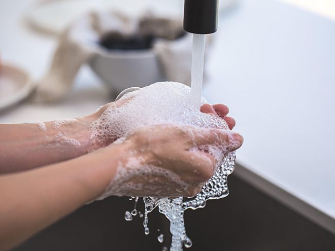 Person washing his hand 545014